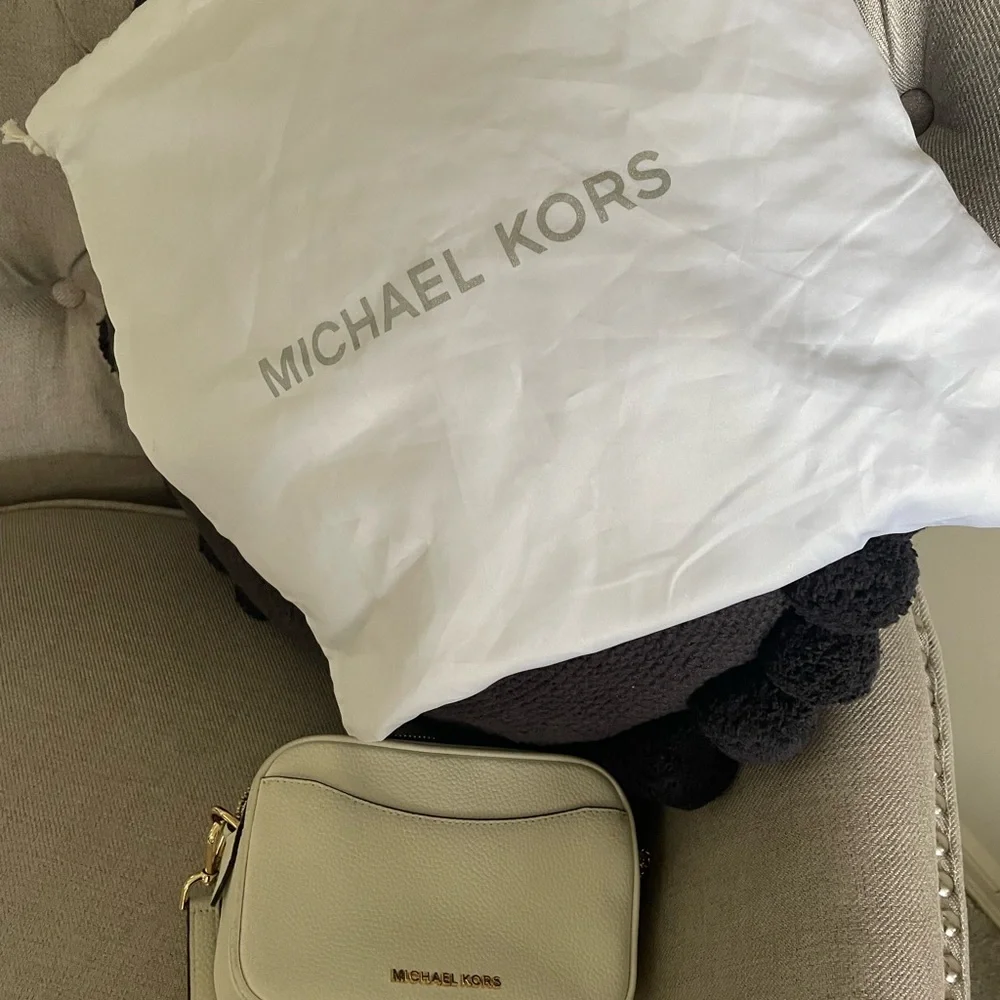 Michael Kors White Pebbled Leather Crossbody with Tassel